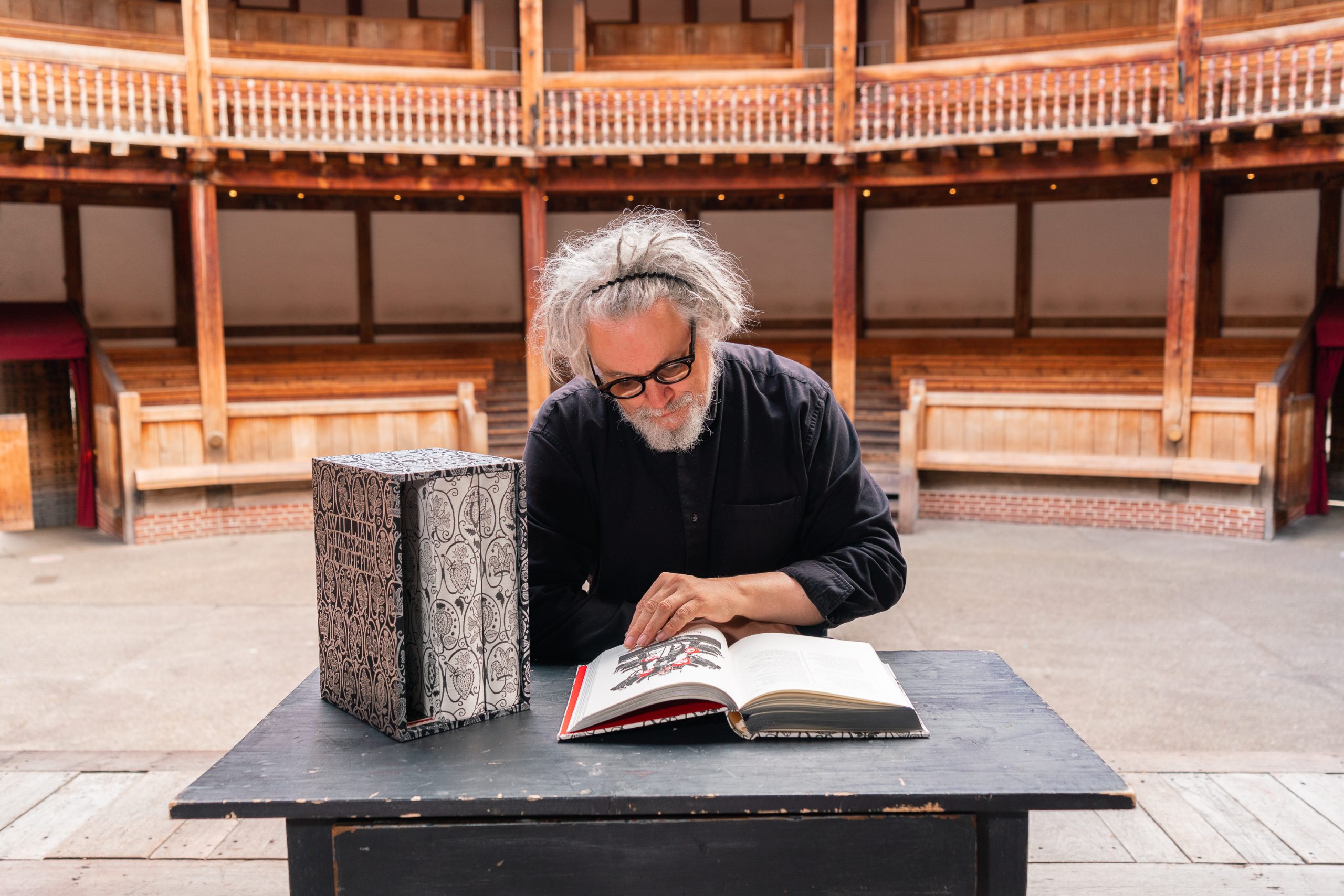 Man looking at book