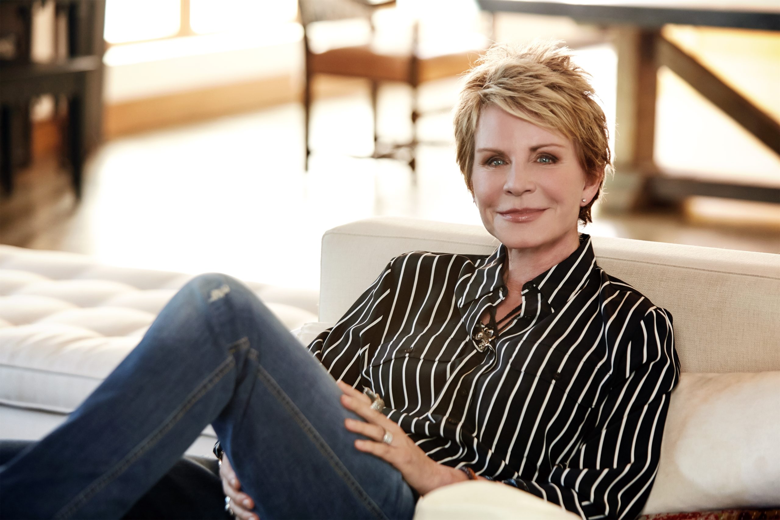 woman in striped shirt smiling